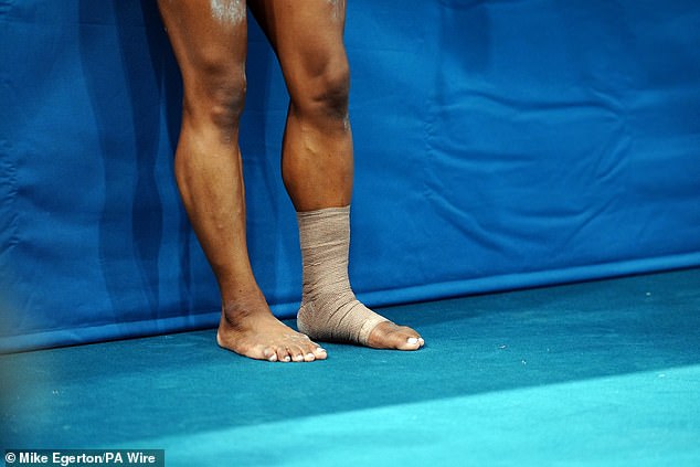 The four-time Olympic champion was also seen with tape around her left ankle