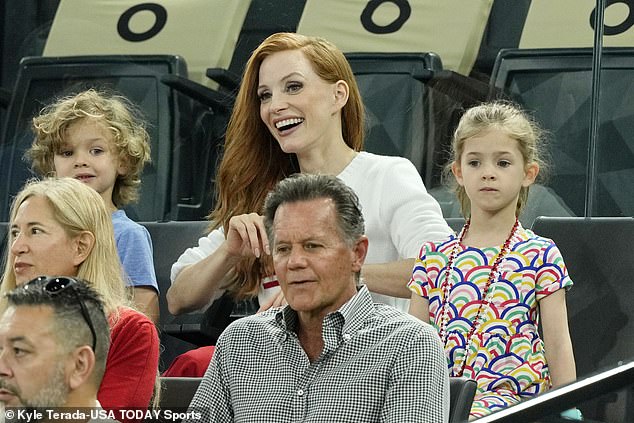 The Oscar-winning actress, 47, looked radiant as she sat in the stands with her daughter Giulietta, six, and son Augustus, four.