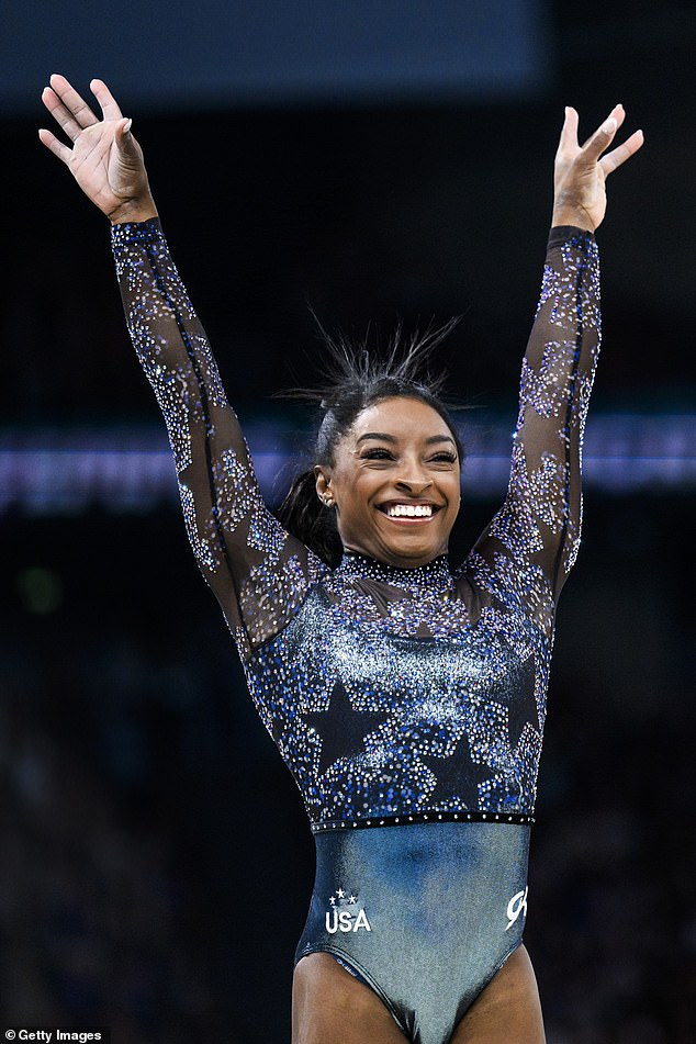 But she was greeted by a standing ovation from the crowd before producing a near-perfect return, scoring a total of 59.566 to top the all-around rankings with three subdivisions remaining.