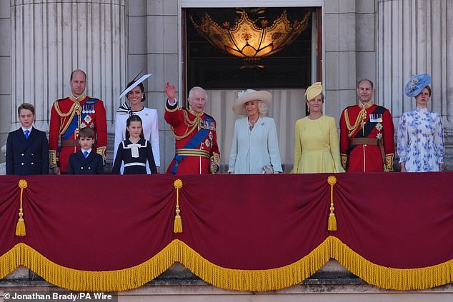 King Charles waves to the crowd from the balcony of Buckingham Palace during Trooping the Colour on June 15. Pictured left to right: Prince George, The Prince of Wales, Prince Louis, Princess Charlotte, The Princess of Wales, King Charles, Queen Camilla, The Duchess of Edinburgh, The Duke of Edinburgh and Lady Louise Windsor