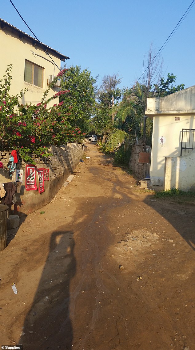 Elly's body was found dumped outside this grim public toilet block in the heart of Tofo