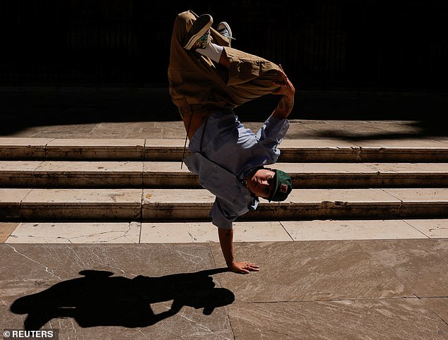 Like gymnastics or swimming, breaking requires speed, strength and athleticism. Here, Spanish breakdancer Laura Garcia, 29, performs on a street in Granada, Spain, July 22, 2024