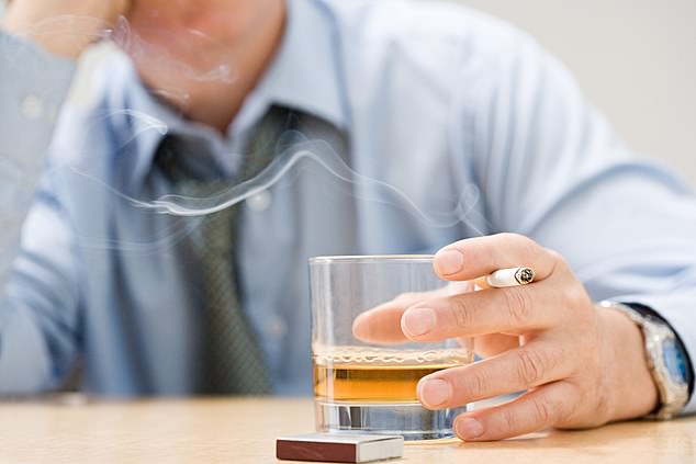 One lifestyle change that may reduce the risk of dementia is quitting alcohol and cigarettes (stock image)