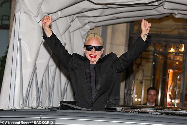 The Bad Romance hitmaker could be seen with a big smile on her face as she stood by the open skylight as the clip played