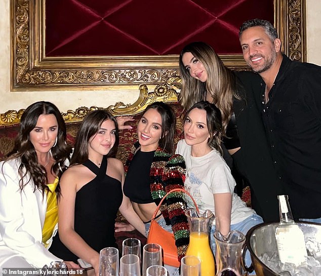 Kyle and Mauricio pictured with their daughters Alexia, Sophia, 24, Portia and Farrah, 35