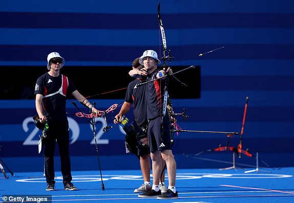 PARIS, FRANCE - JULY 29: Conor Hall of Team Great Britain shoots during the men's 1/8 elimination match between Team Chinese Taipei and Team Great Britain on day 3 of the Paris 2024 Olympic Games at Esplanade Des Invalides on July 29, 2024 in Paris, France. (Photo by Julian Finney/Getty Images)