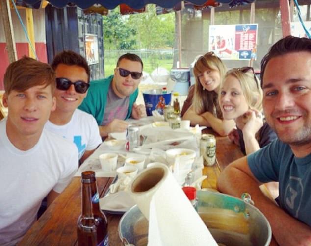 Dustin and Tom pictured with friends on their one year anniversary in 2014