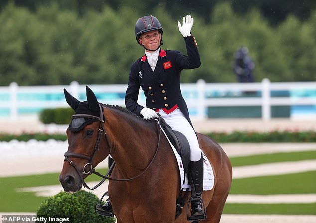 Canter waves to the crowd at Lordships Graffalo after competing in the dressage on Saturday