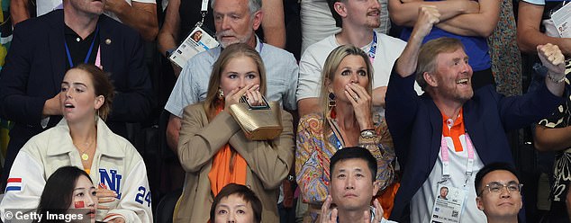 While some images show the Queen looking irritated, at other times during the sporting action the royals seemed more engrossed in the swimming (pictured left: Alexia, Princess of the Netherlands; Catharina-Amalia, Princess of Orange; Maxima, Queen of the Netherlands; and Willem-Alexander, King of the Netherlands)