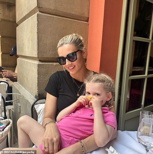 Jasmine captioned the photos: 'A beautiful welcome to Paris by @airbnb. Thank you for hosting us during the Olympics.' Pictured with daughter Harper