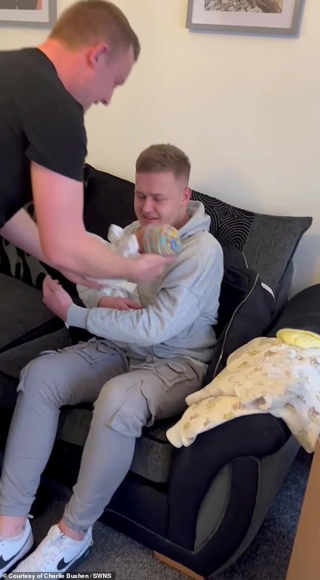 Liam gently places little Reuben in his arms next to his brother, as an emotional Tyler asks the couple what newborns are called