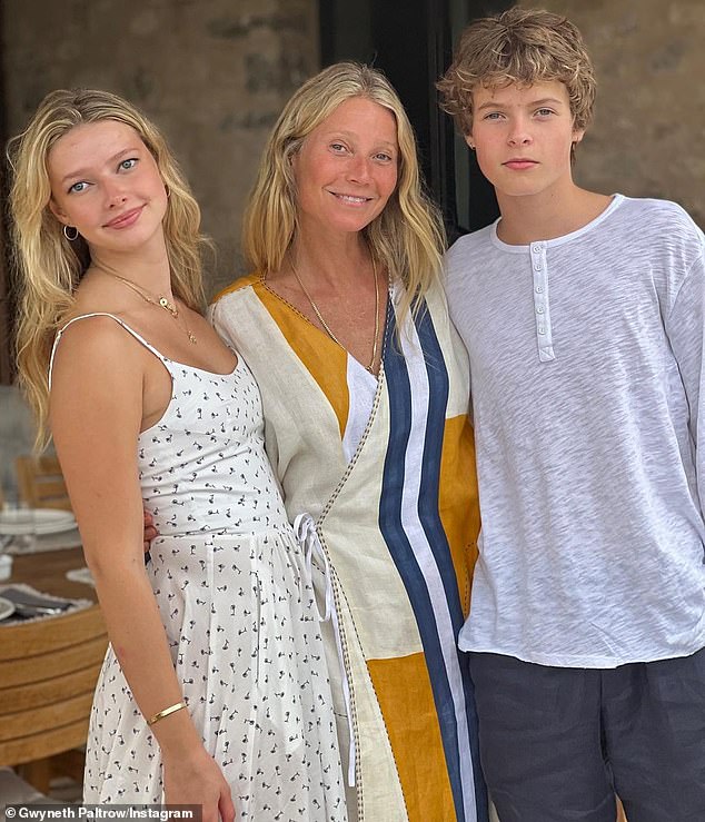 Gwyneth married Coldplay frontman Chris, 47, in 2003 and they had daughter Apple, 20, and son Moses, 18, before splitting in 2014, which the Seven star famously described as a 'conscious uncoupling' (pictured with Apple and Moses)