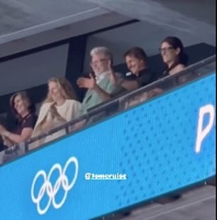 The veteran actor watched a relay race with friends on the second day of the Paris Olympics