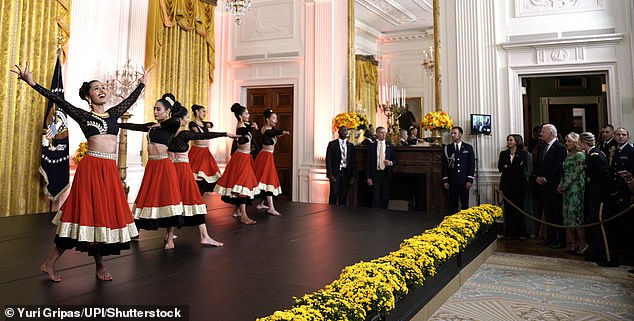 Vice President Kamala Harris watches a performance during a Diwali reception in the East Room of the White House