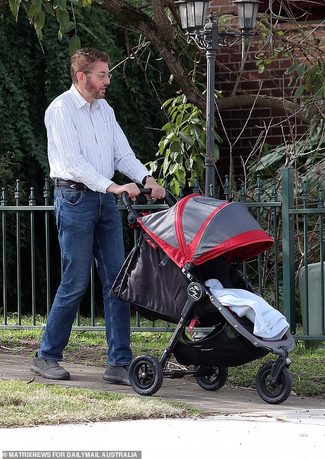 Father Stephen Scholem was spotted this week pushing his grandchild, Firerose's niece, in a stroller near his home in Sydney's north