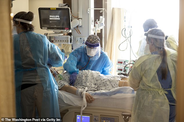 A team of nurses and doctors treat a patient at St. Cloud Hospital in St. Cloud, Minnesota, considered the nation's best healthcare system.