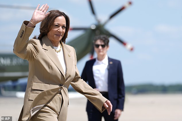 Vice President Harris waves as she heads to Air Force Two to travel to Pittsfield, MA on July 27