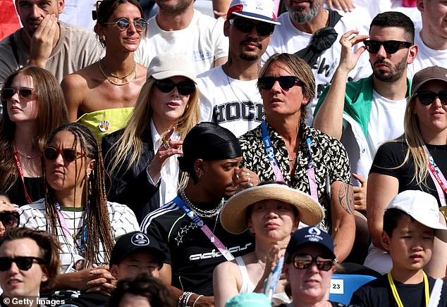 The family are in the City of Lights for the Olympics and were spotted watching 14-year-old Australian skateboarder Chloe Covell compete