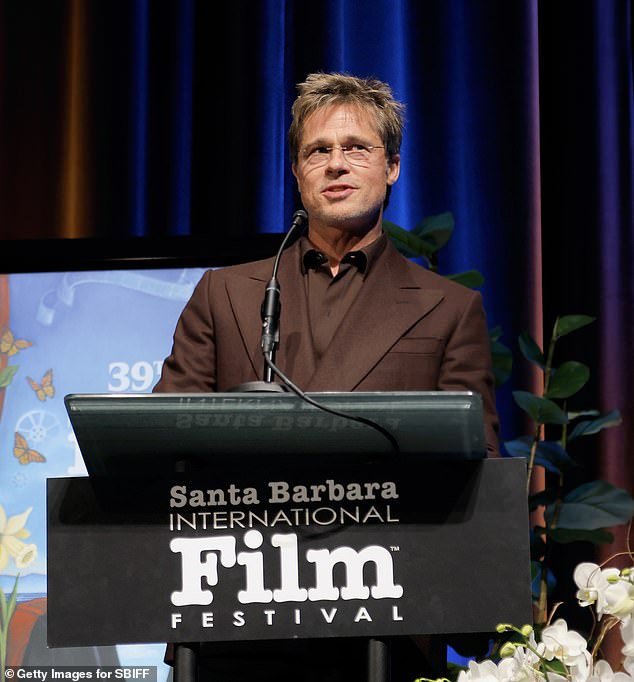 Her estranged father Brad Pitt, 60, was photographed at The Arlington Theatre in Santa Barbara, California in February