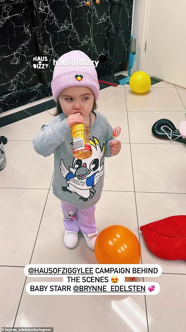 The American socialite took to Instagram with an adorable snap showing the little one drinking a bottle of juice with a lollipop in his hand