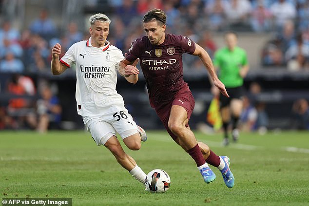 Grealish (right) has played in both of Man City's opening pre-season games, with his side suffering a defeat to AC Milan and a loss to Celtic