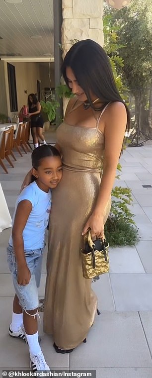 Kim was slammed by Khloe for her outfit — a gold dress that looked like something you'd wear to a red carpet event, not a toddler's birthday party