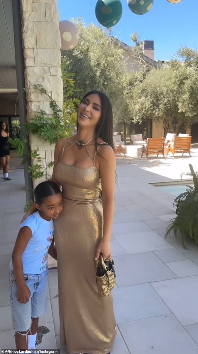 Her daughter Chicago, six, clung to her as she chatted with her sister, as seen in Khloe's stories