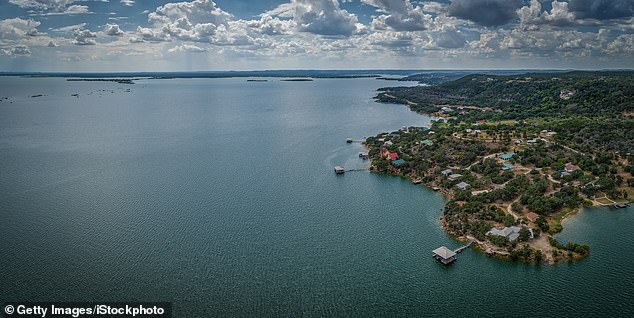 Burnevik bought a piece of land near Lake Buchanan (pictured) and spent the last six years hand-building his dream home