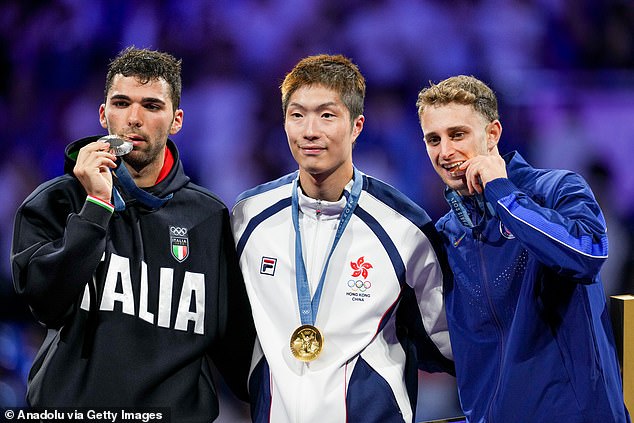 Filippo Macchi (left) and the Italian Fencing Federation were not satisfied with their silver