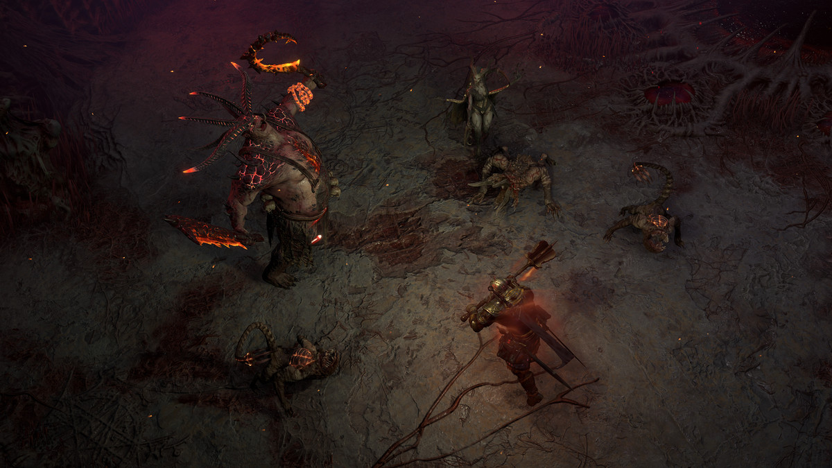 A Barbarian takes on the Butcher and several other Demons in Diablo 4's Infernal Hordes