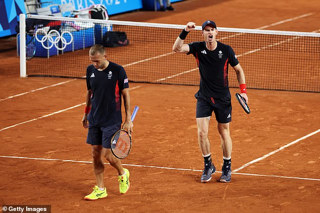 Murray raises his fist during a thrilling doubles match at Roland Garros on Tuesday night