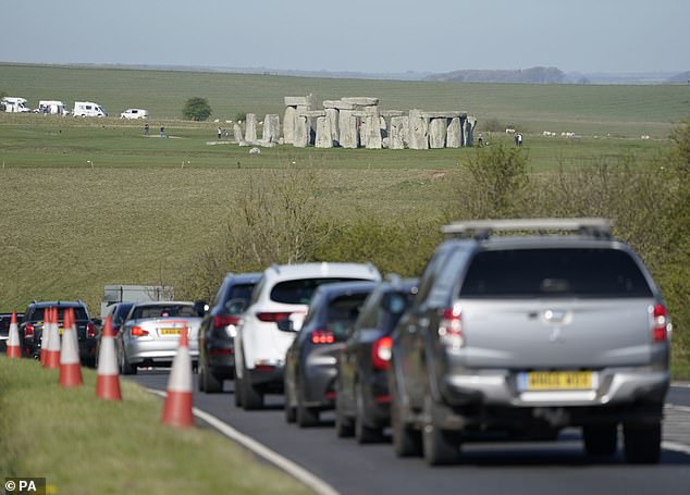 Axed: The Chancellor told MPs the government will scrap several transport schemes, including the A303 tunnel at Stonehenge (pictured)