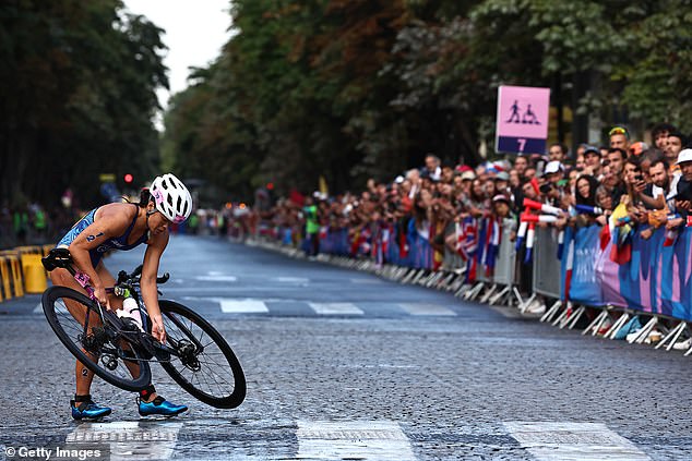 Manami Iijima of Guam was the first triathlete to crash during the women's race