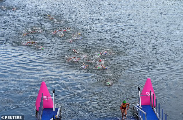 Triathletes took to the River Seine, with water quality expected to have improved sufficiently