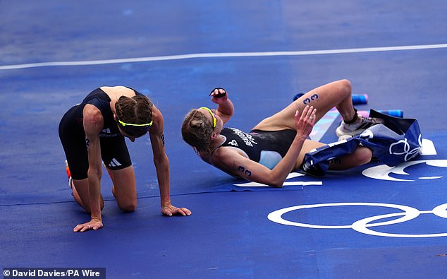 Potter (left) collapsed to the ground exhausted after crossing the finish line after nearly two hours of racing