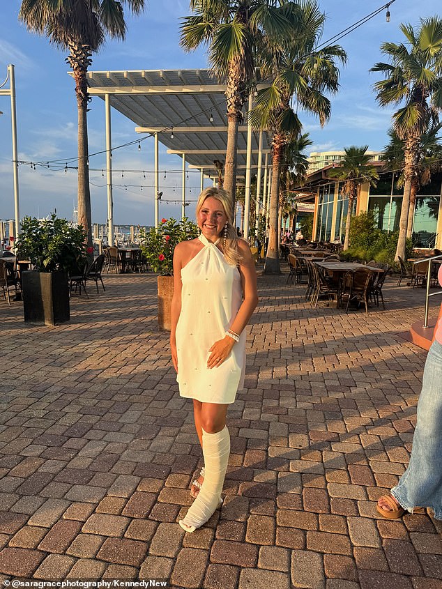 The social media marketer is pictured on a night out during her bachelorette party with a cast to protect her leg