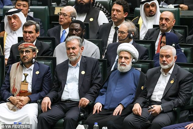 Palestinian Islamic Jihad leader Ziad al-Nakhala and Palestinian Hamas group leader Ismail Haniyeh attend the swearing-in ceremony of new Iranian President Masoud Pezeshkian at the parliament in Tehran, Iran, July 30, 2024.