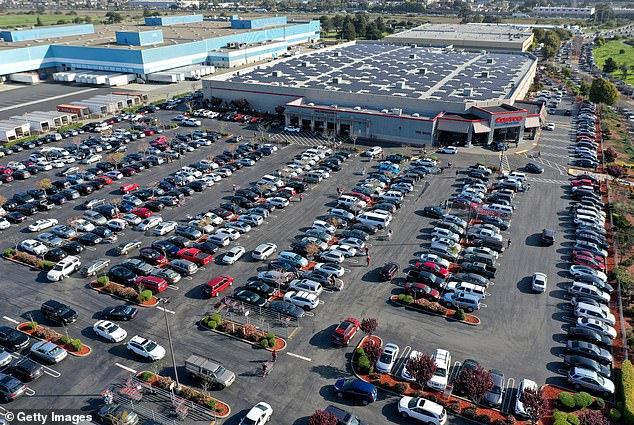 Pictured: A crowded parking lot at a Costco store in Richmond, California