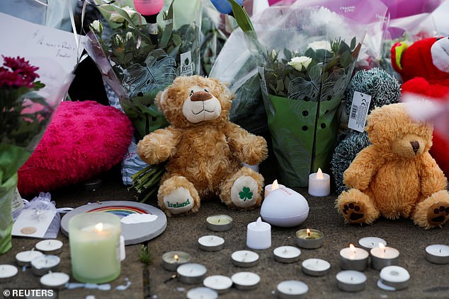 During a vigil held in the city last night, sympathizers left candles, flowers and stuffed animals