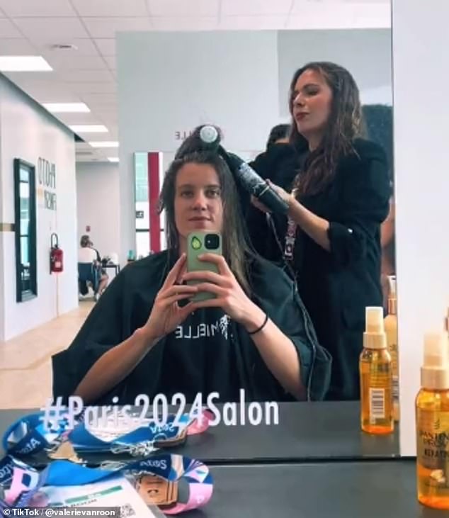 Dutch swimmer Valerie Vanroon had her hair washed, cut and styled during her trip