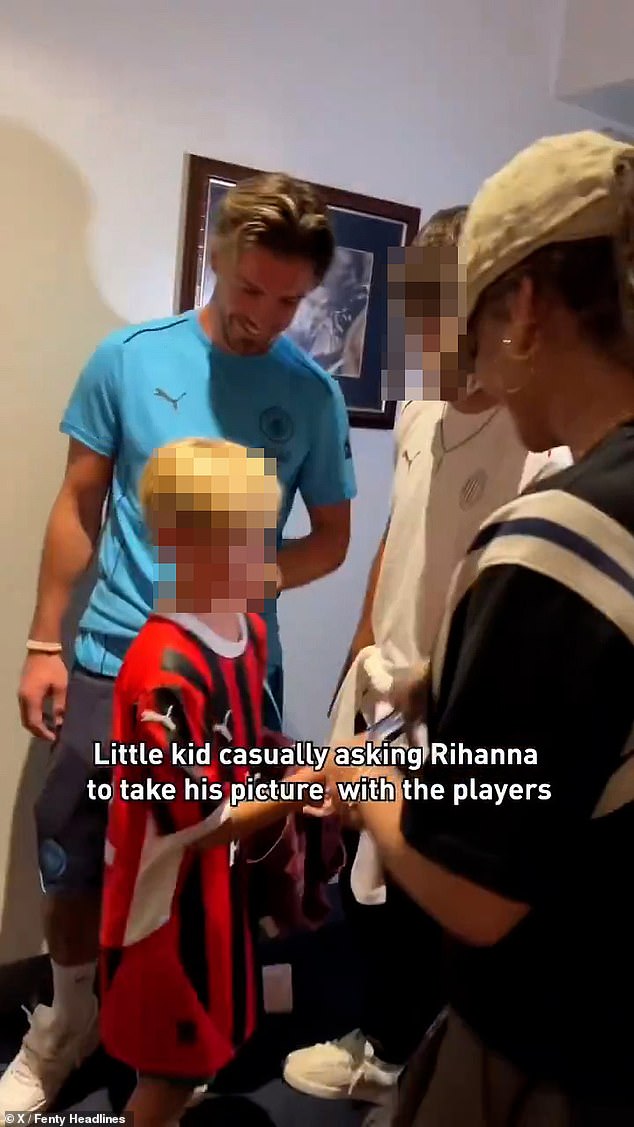 But a fan who was also in the room approached Rihanna and, apparently not recognizing her, asked her to take a photo of him with the footballers