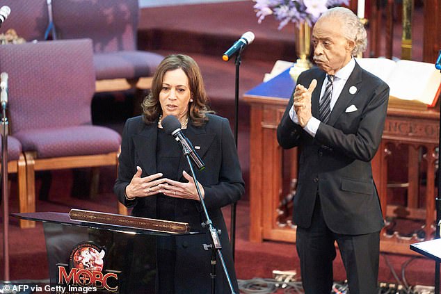 US Vice President Kamala Harris with Reverend Al Sharpton at a funeral