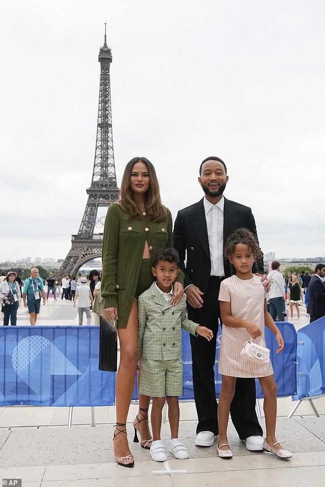 Chrissy was photographed in Paris on July 26 with Miles, Luna and her husband John Legend