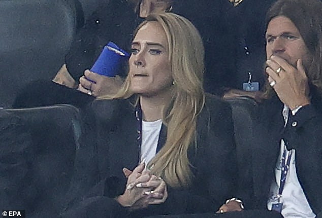 Adele looked focused as she nervously clasped her hands together in the stands ahead of the European Championship semi-final between England and the Netherlands in Dortmund, Germany, on Wednesday night