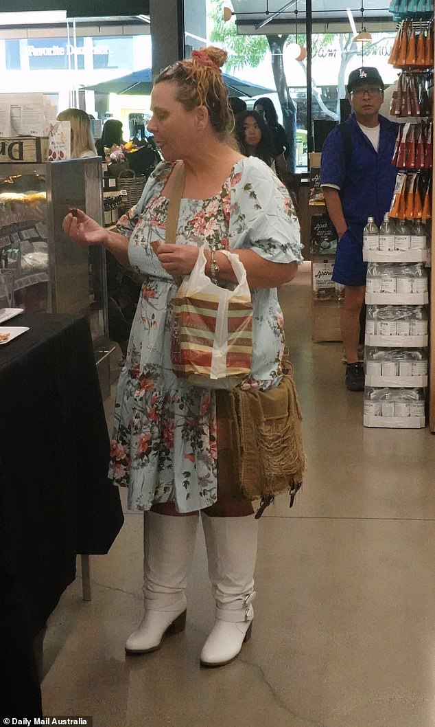 The former Biggest Loser presenter, 55, showed off her figure in a blue floral print summer dress as she was spotted doing some grocery shopping at a supermarket