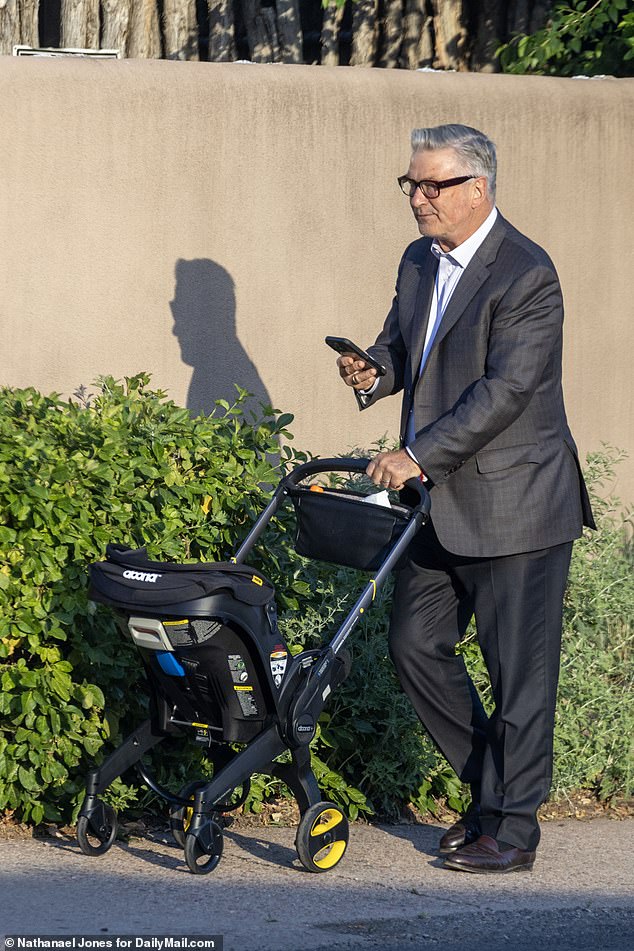 Alec Baldwin was seen pushing a stroller hours after a jury was empaneled for his manslaughter trial