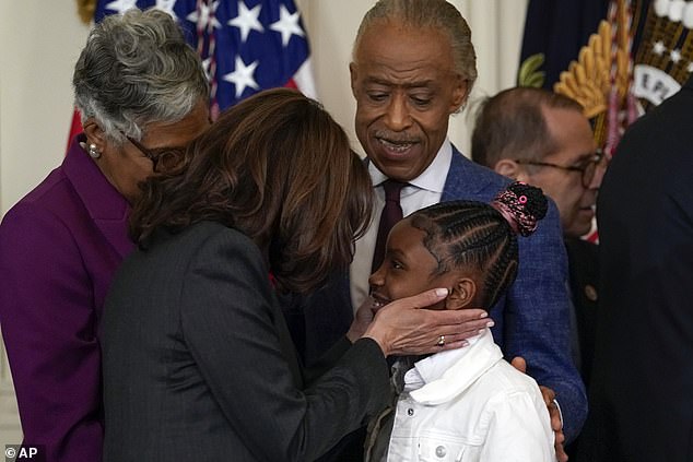 Vice President Kamala Harris speaks with Gianna Floyd, the daughter of George Floyd,