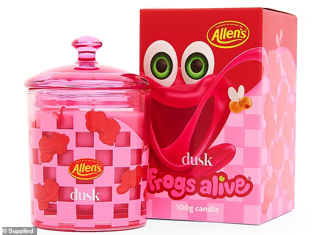 Allen's Lolly's and Dusk have joined forces to release a range of candles, fragrance oils, room diffusers and bath bombs (pictured is the Frogs Alive candle)