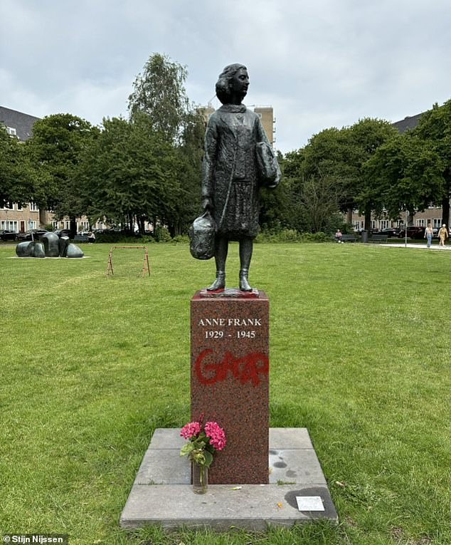 The statue of Holocaust victim Anne Frank in Amsterdam has been defaced with 'Gaza' graffiti, sparking outrage among Dutch politicians