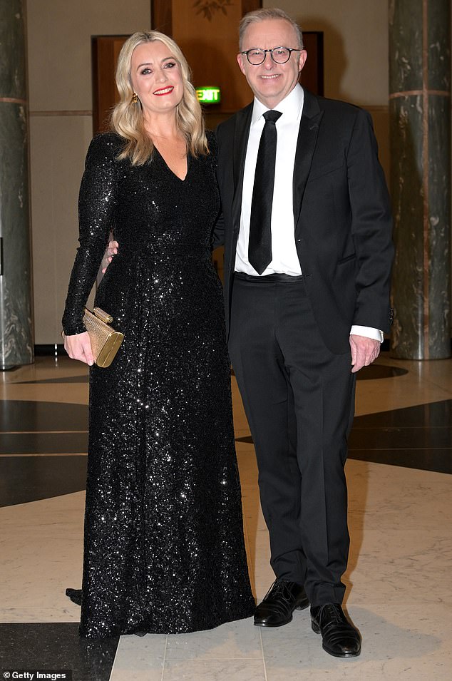 The Prime Minister and his fiancée Jodie Haydon (pictured) showed some empathy for what ordinary Australians are going through this week when Ms Haydon wore the same dress to the Midwinter Ball as two years earlier.